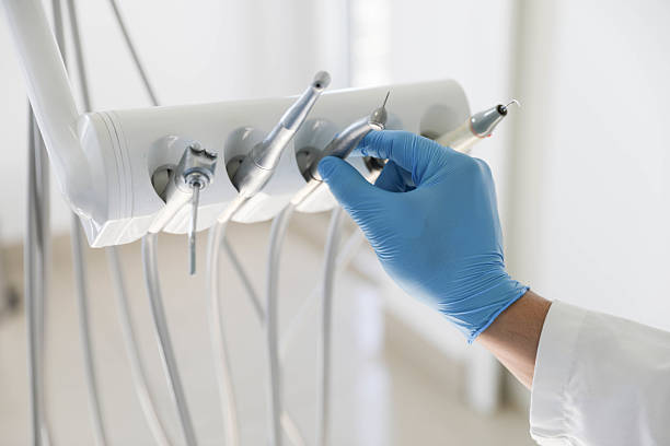 Professional Tooth Extraction technician working in Eaton Rapids, MI